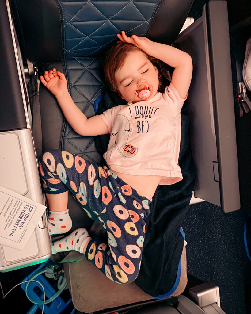 Premium economy seats cost us nearly nothing. The seats had more legroom and came with extras, like better food and free in-flight WiFi - the kids didn't notice the lack of legroom and it cost fewer points to book than first or business class. Photo by Amy Berrian.