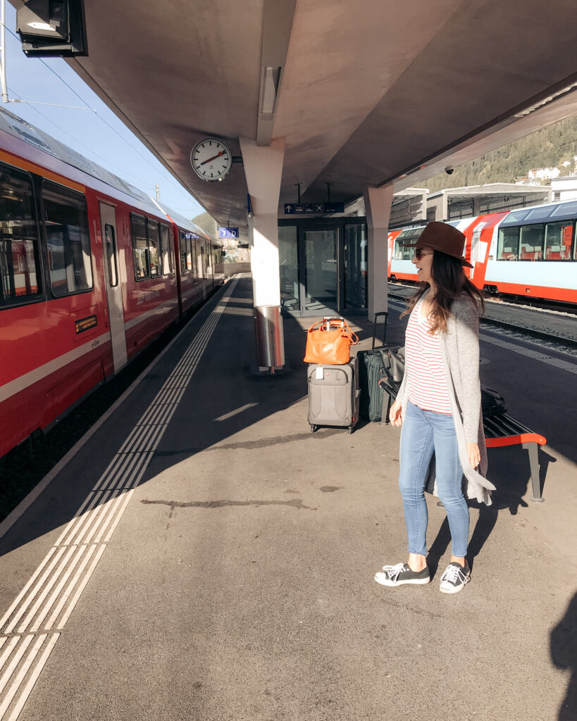 Amy waits to board the Bernina Express - one of the most scenic train rides in Europe.