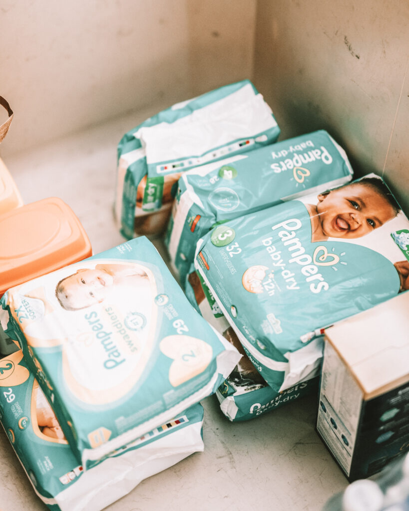 Earn points and miles by using credit cards for everyday expenses like Pampers diapers. Maximize rewards on essential purchases. Photo by Nathan Dumlao.