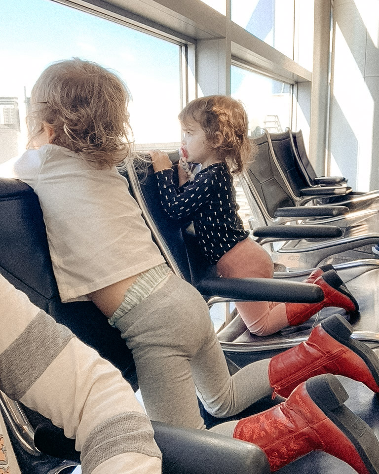 toddlers at airport. Photo by Amy Schadt.