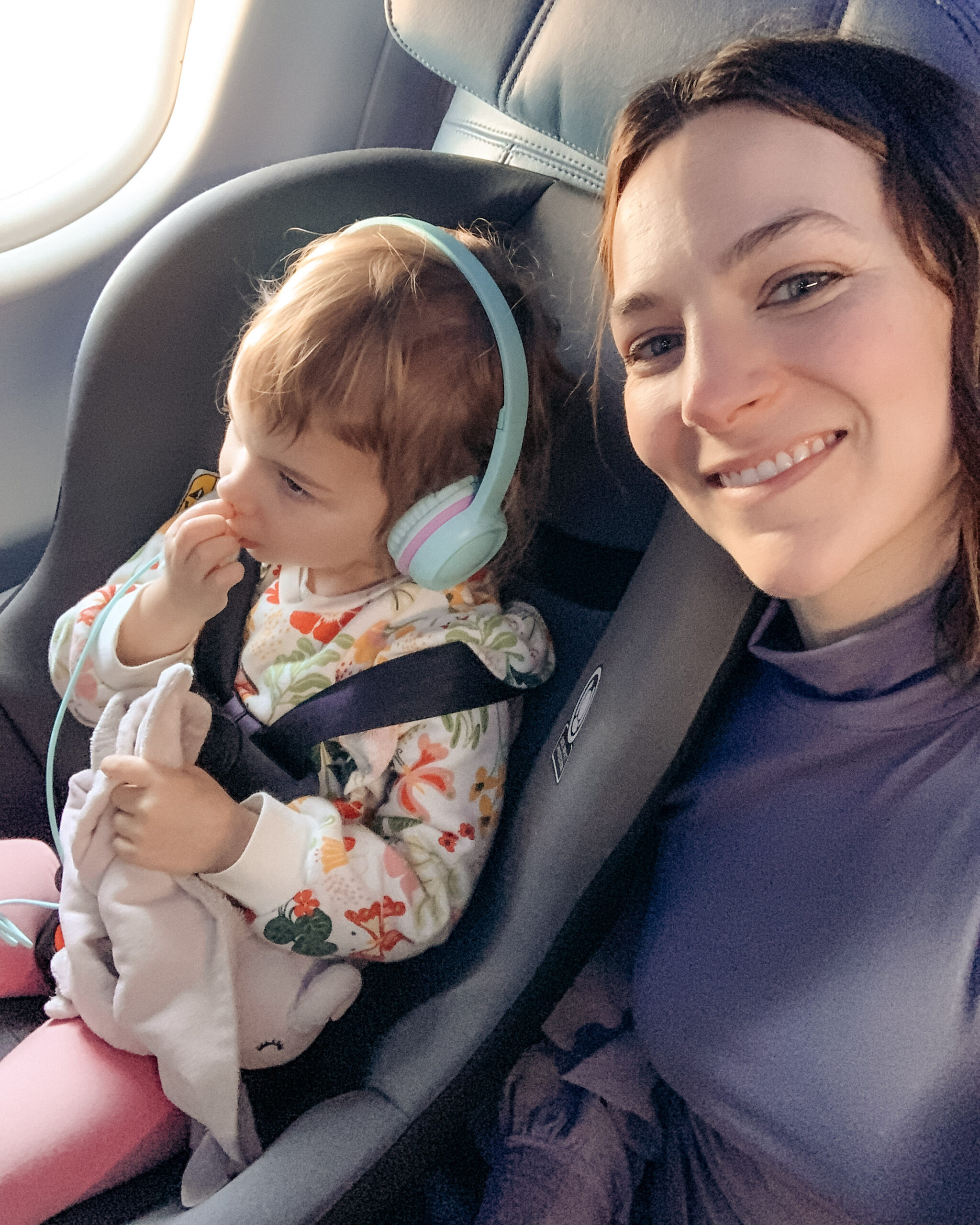 Mom and toddler fly on plane