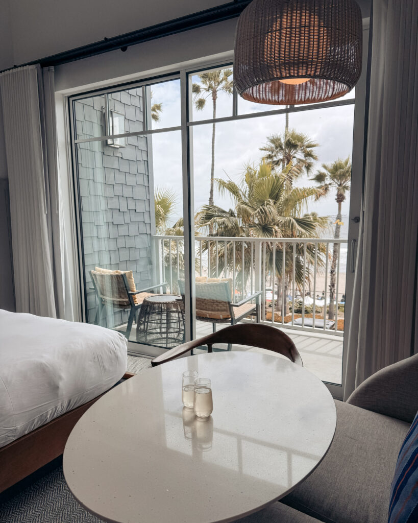 Welcome champagne from The Seabird Resort + the ocean view from our hotel room.