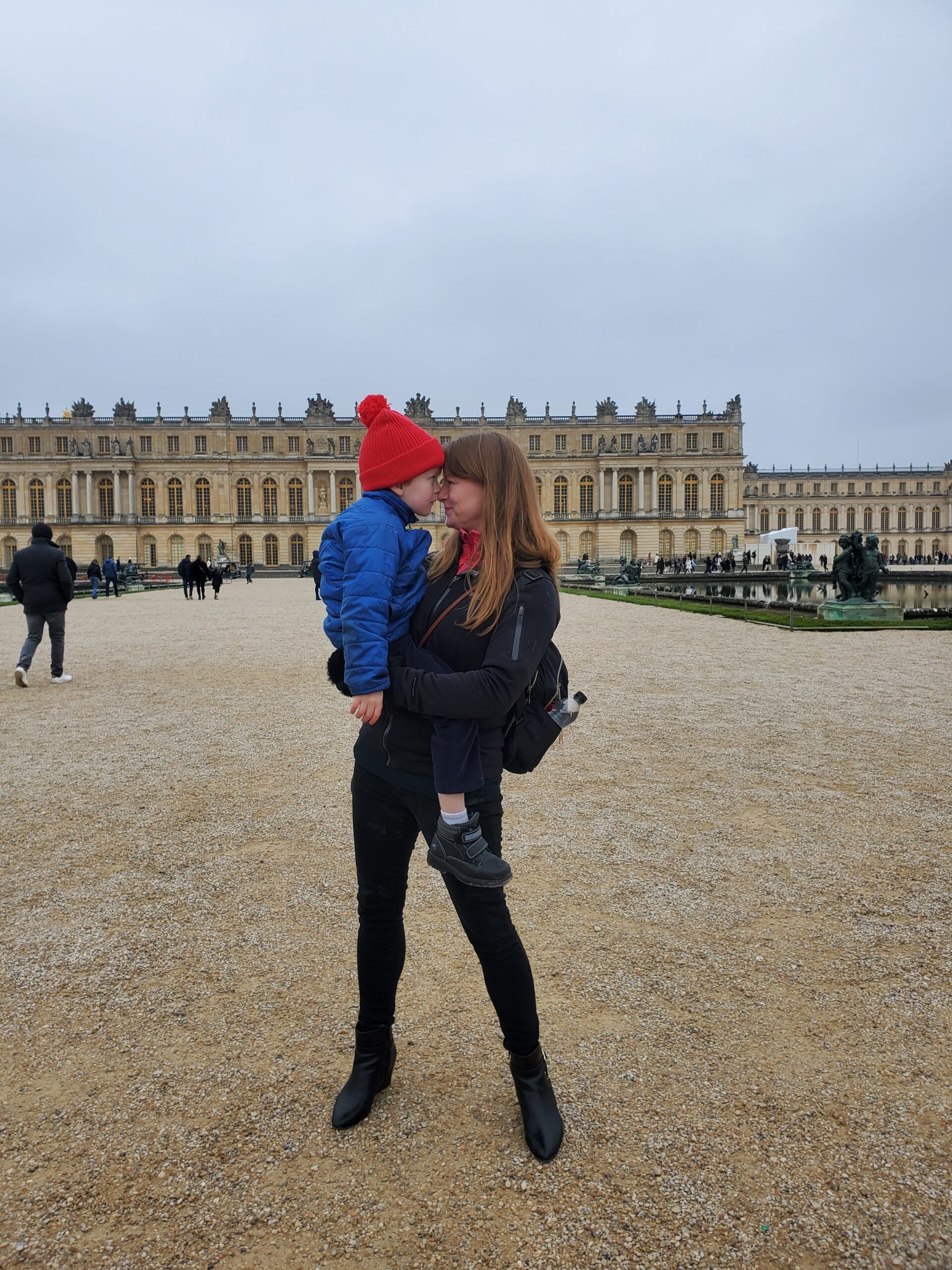 Chelsea S. and her child traveling in London